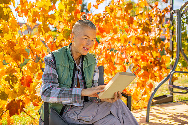 Surprised Young Man with a Book on the White Background