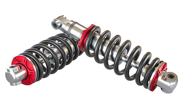 istock Automotive shock absorbers with coil springs on white background 2243987221