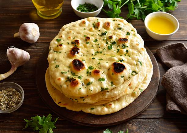 istock Indian naan bread with garlic butter 2243992501