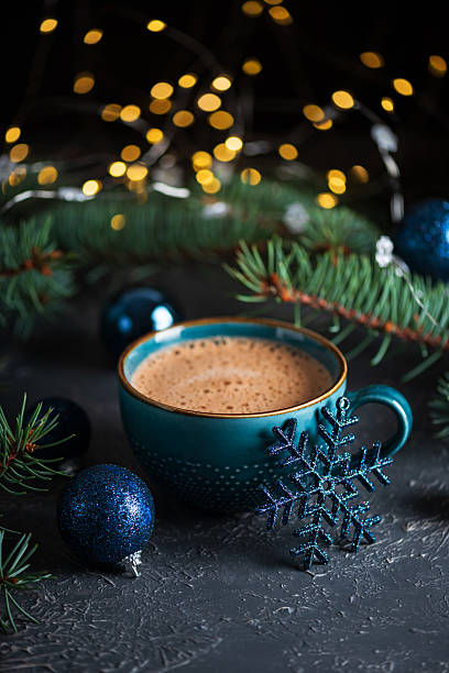 istock Teal Mug with Hot Chocolate and Snowflake Ornament in Festive Christmas Setting 2243992541