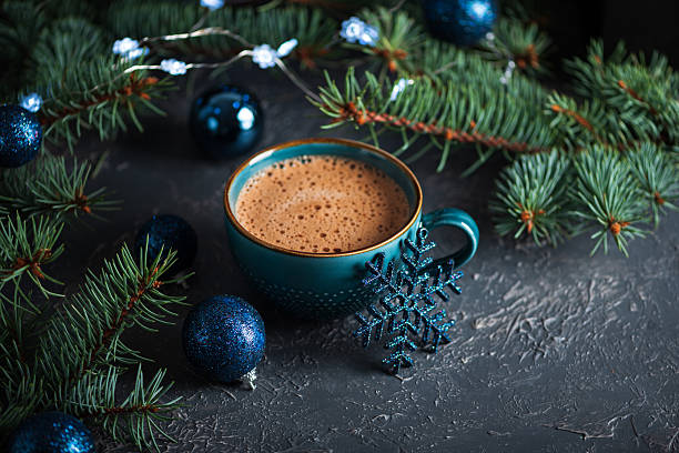 istock Teal Mug with Hot Chocolate and Snowflake Ornament in Festive Christmas Setting 2243992544