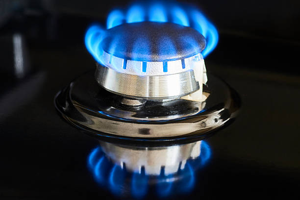 istock Blue Gas Flame on Kitchen Burner - Macro Eye Level View 2243992850