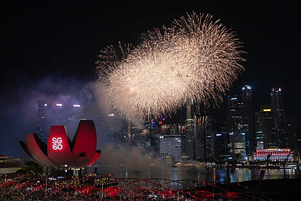 31 December 2024, Marina Bay - Singapore.Vibrant fireworks illuminate Singapore’s skyline during New Year celebrations, filling the city with color and energy. The year 2025 holds special meaning, marking the 60th anniversary of Singapore’s founding.