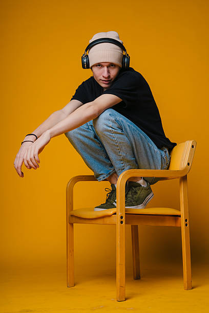 istock creative musician in workspace, musician sitting thoughtfully in vibrant studio environment 2243995199