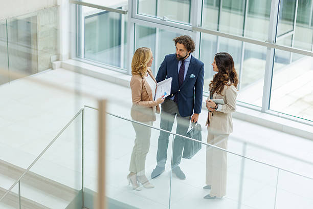 istock Business people discussing document during corporate meeting 2243999234