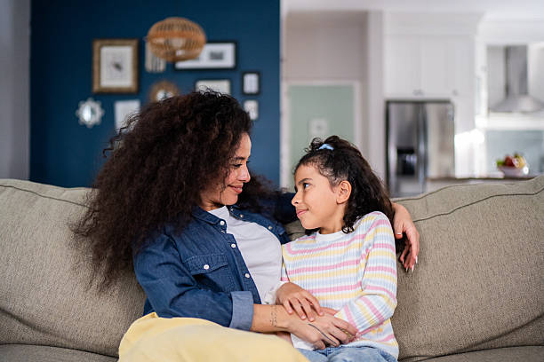 istock Mother and daughter talking at home 2244004168