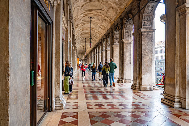 Tourists are walking on St Marks Square in the early morning,Venice,Italy