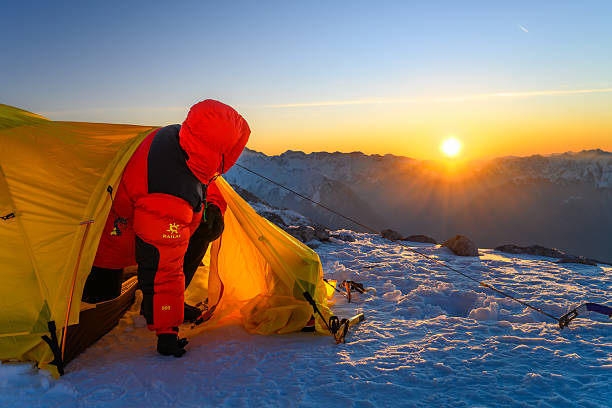 Climbers climbing Aconcagua peak in winter onditions, South America