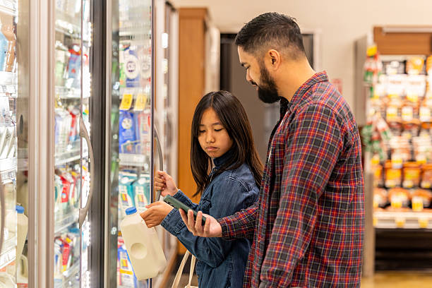 istock Father and Daughter Grocery Shoppping 2244011084
