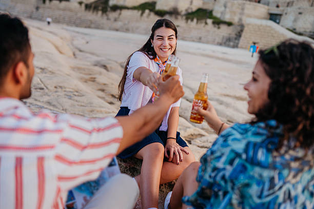 Happy friends laughing and smiling outdoors