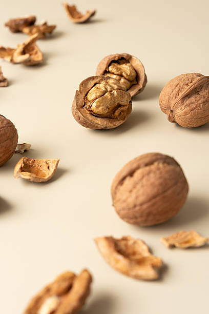 istock Close-up of walnuts and shells 2244013047