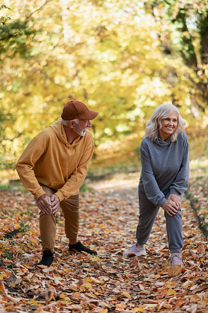 istock Senior Couple Exercising by Walking 2244018183