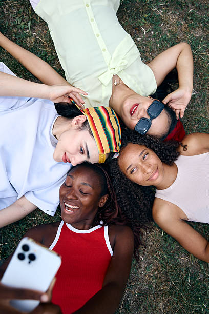 istock Group of Friends Taking a Selfie Outdoors on a Sunny Day 2244027899