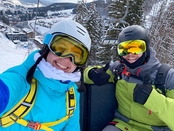 istock Skiers Taking Selfie on Snowy Mountain 2244030596