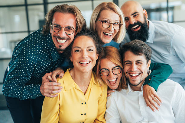 istock Business team embracing after achieving goals 2244041463