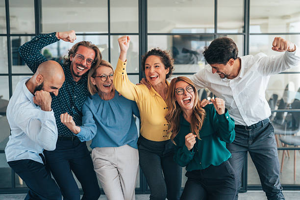 istock Business team celabrating after achieving goals 2244041517