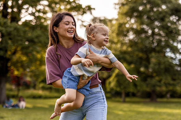 istock Family Fun and Laughter in the Park 2244043946