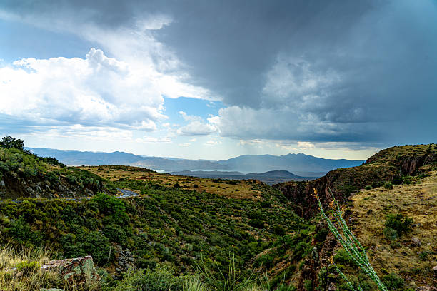 Panoramic view down the North Kaibab Trail below Coconino Overlook to the Roaring Springs Canyon deep in the desert wilderness of the Grand Canyon National Park, Arizona, USA.