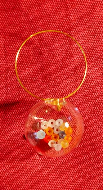 istock Glass-Ball with perls and golden ring 2244047635