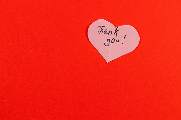 istock Handmade thank you card on red background for appreciation message 2244051631