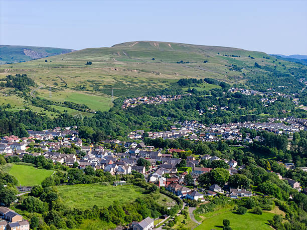istock Green Rolling Hills Surrounding a Welsh Valley Town 2244053402