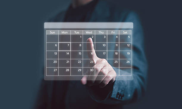 istock Business people use work schedules in business as a technological plan and project for proper planning and knowing the timeline of the work progress. 2244065164