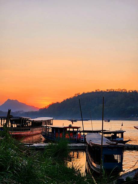 istock Sunset over the Mekong Serenity in Luang Prabang 2244065327