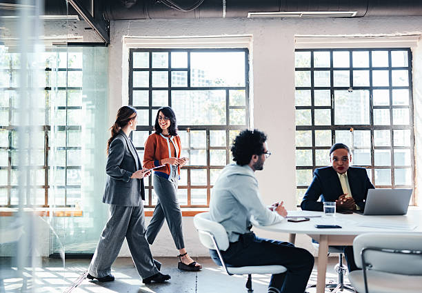 istock Professional Office Meeting With Diverse Team Discussing Ideas In Bright Modern Workspace 2244066226