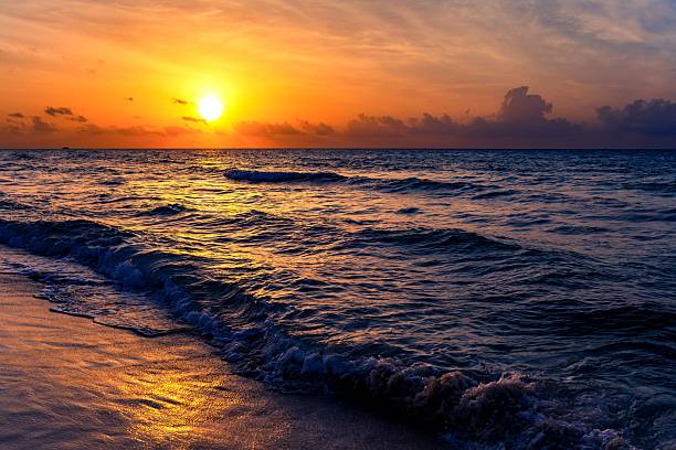 istock Sunset over the ocean with vibrant reflections. 2244070570