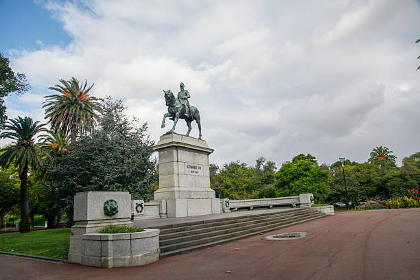 istock Equestrian statue in a park with greenery and cloudy sky 2244071500