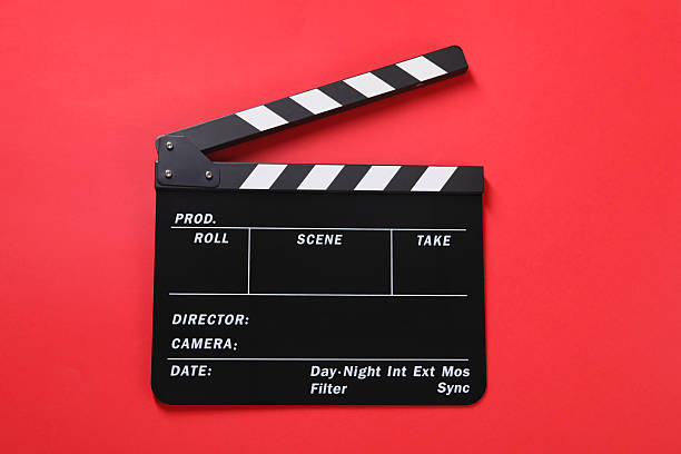 istock Clapperboard on red background, top view. Film industry 2244072780