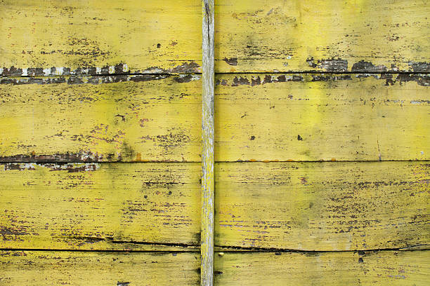 istock old yellow wood wall texture background 2244074505