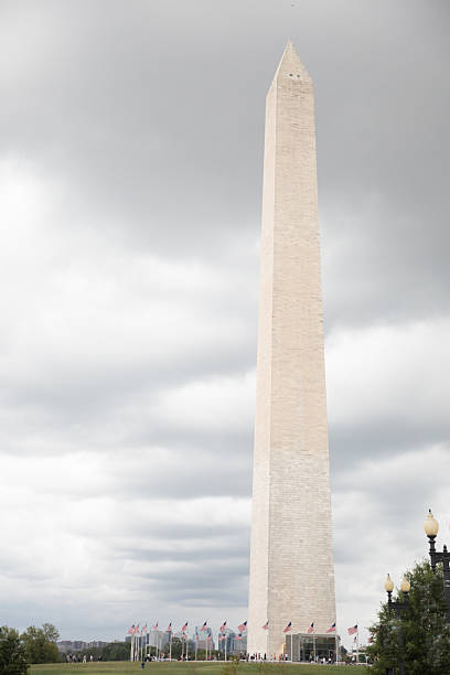 istock Washington Monument stands tall against a moody sky in Washington D.C 2244076370
