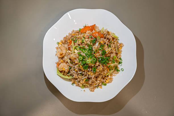 istock Directly Above View Shrimp Fried Rice Served on White Plate 2244076592