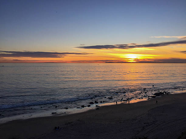 istock Beautiful sunset over the calm ocean at the beach 2244078237