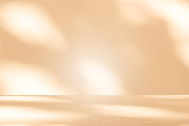 istock Studio style background wall decoration presentation uses white and beige tones. with shadows cast from a nearby window, concept creating a decorative 2244086564