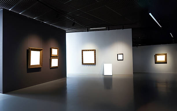 Man in the art gallery looking at paintings, abstract contemporary art concept