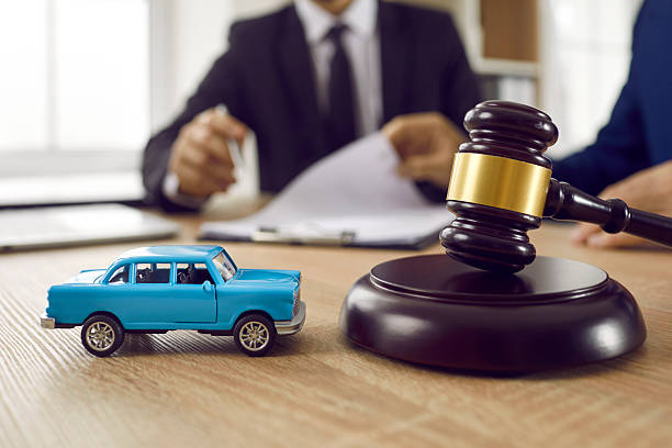 istock Barrister and car model on notary table 2244091180