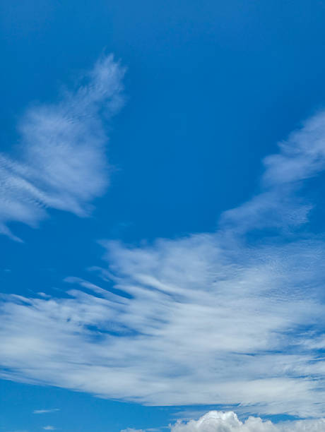 istock Deep blue sky filled with feather-like cirrus clouds forming natural patterns during a bright sunny afternoon 2244092413