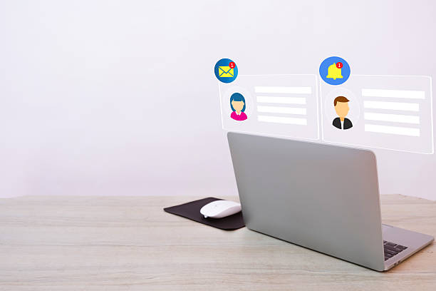 Photo of laptop on table with social media network application icon idea for social media concept.