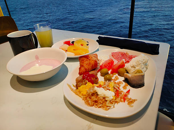 istock Dining Room Buffet aboard the abstract luxury cruise ship. Healthy breakfast at modern liner concept 2244096726