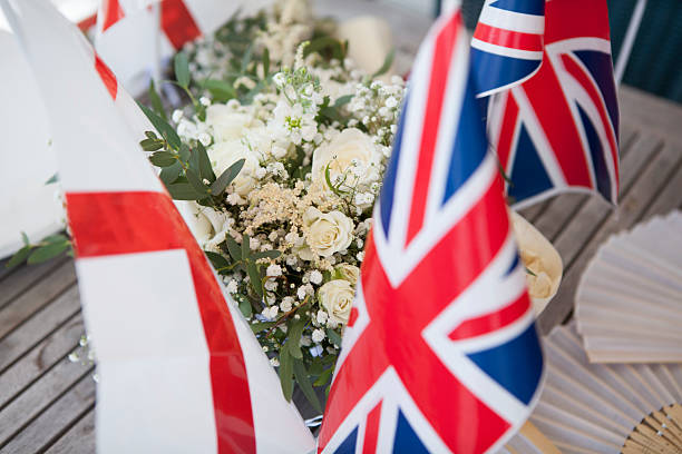 istock Union jack and England flags with wedding flowers 2244096869