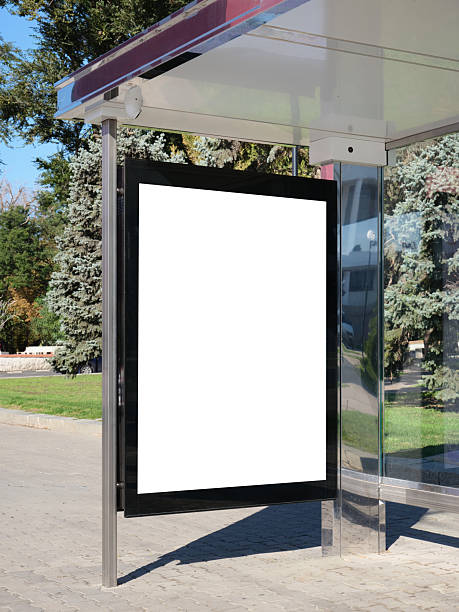 istock A large bus stop in a modern city with empty advertising banners inside. Template for design. 2244096935