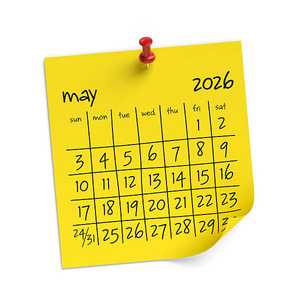 istock Yellow Post It Calendar Showing May 2026 Pinned to White Wall 2244101182