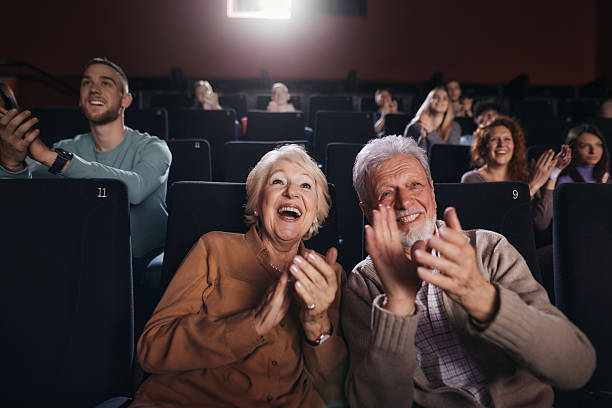 istock Applauding after movie projection in theatre! 2244102202