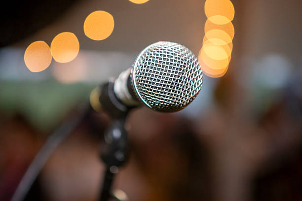 istock Close-up of a microphone with defocussed lights 2244103874