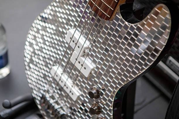 man exercising with bass guitar