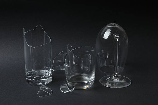 istock Fragments of broken glass on a black background 2244106272