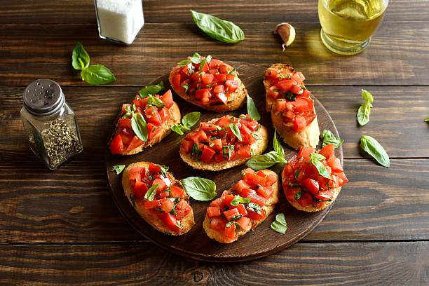 istock Bruschetta with with cherry tomatoes and basil 2244109770