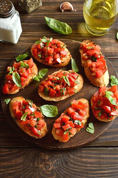 istock Bruschetta with with cherry tomatoes and basil 2244109784